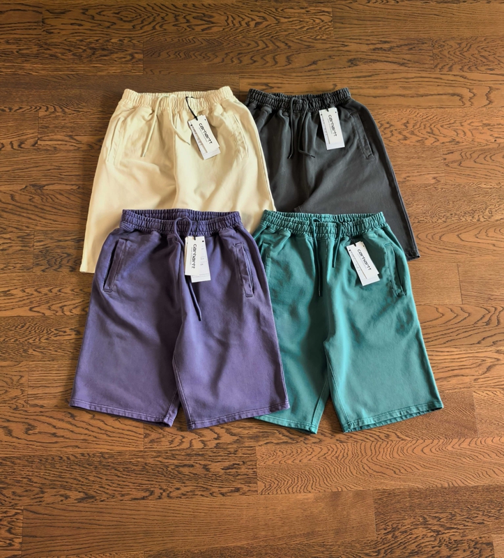 Carhartt WIP solid color washed distressed small logo straight shorts 